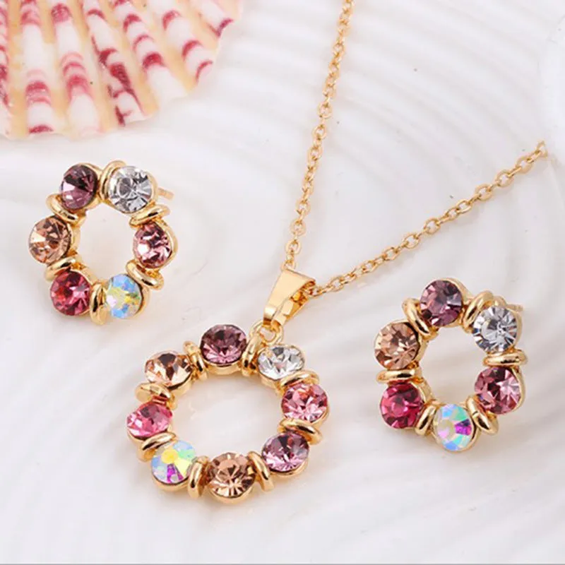 Two piece set of circular colored diamond necklace and earrings